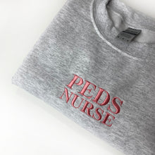 Load image into Gallery viewer, Peds Nurse Sweater