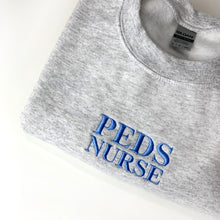 Load image into Gallery viewer, Peds Nurse Sweater
